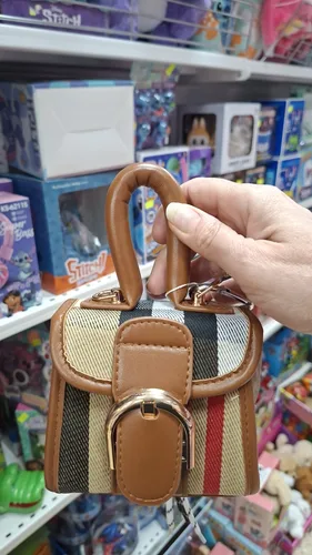 תיק יד פסים חום